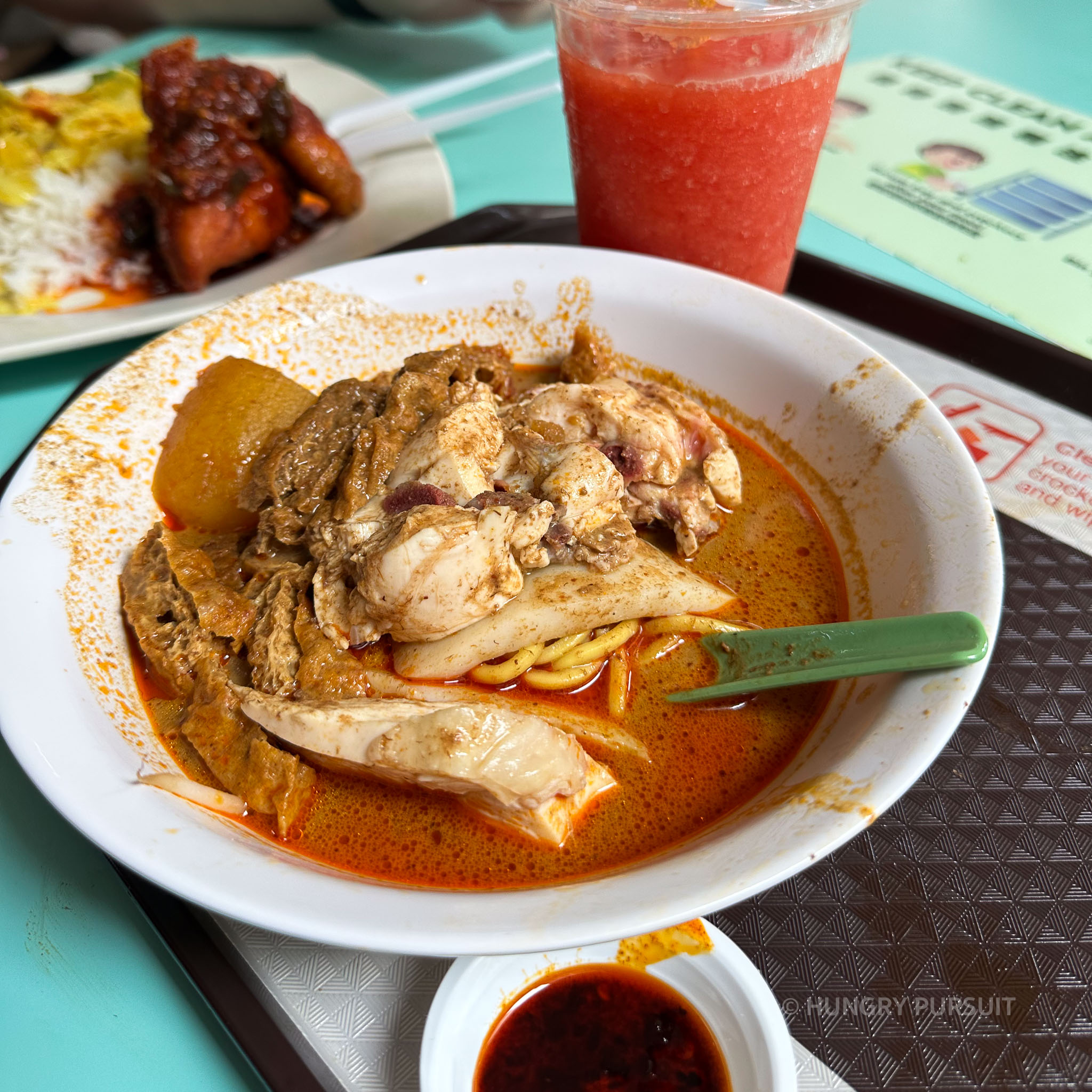Heng Kee for its famous Chicken Curry Mee noodles Hong Lim Market