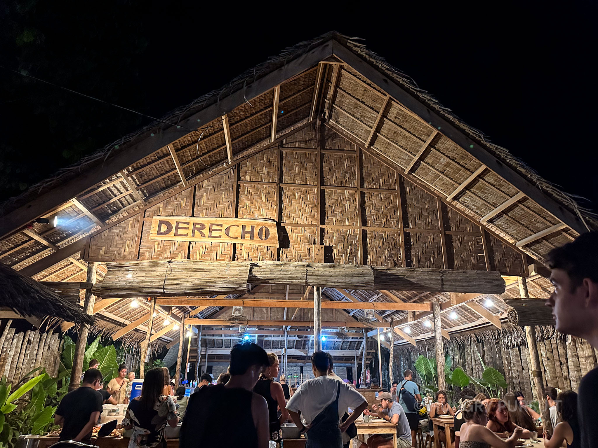 Exterior of Derecho, a popular restaurant in Siargao, showcasing its vibrant atmosphere and inviting ambiance