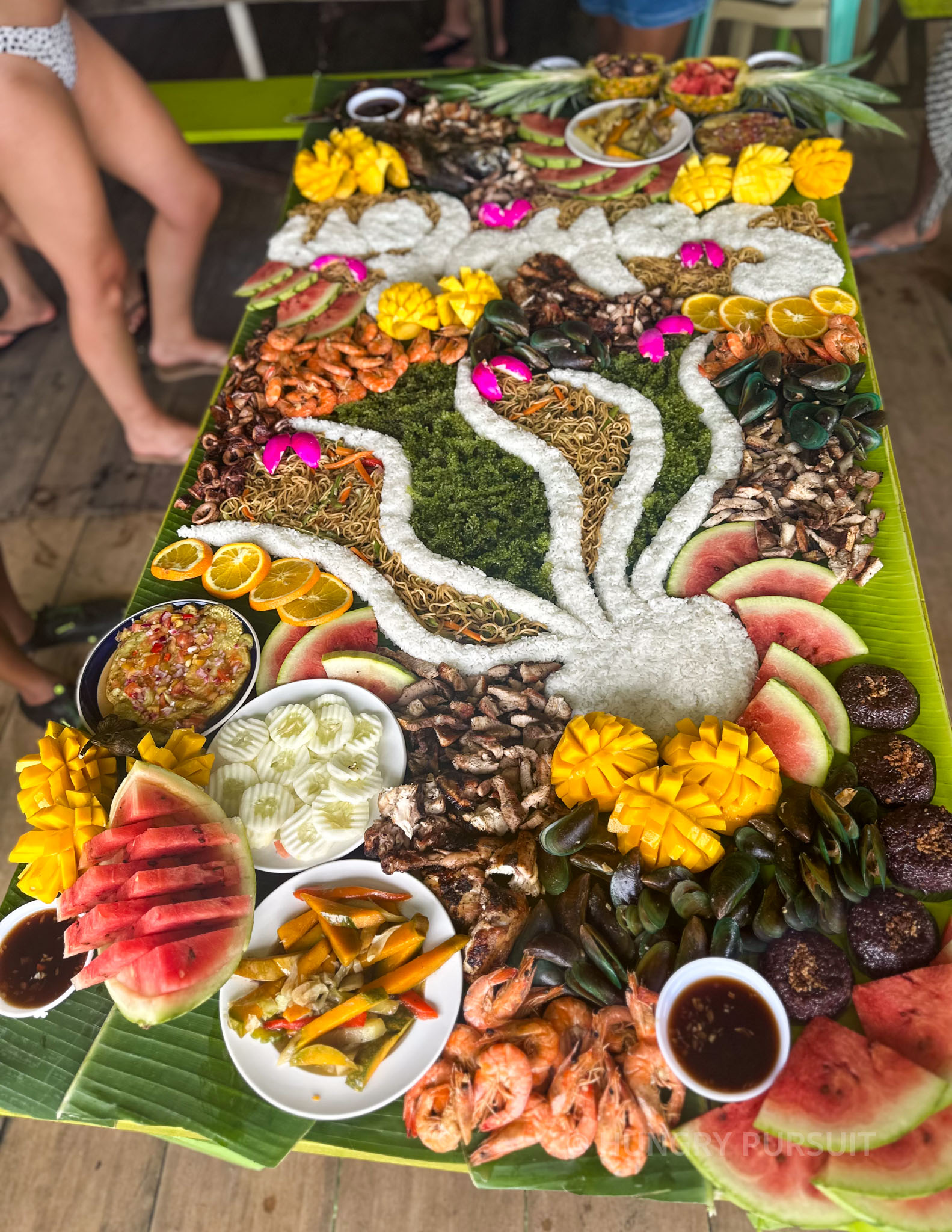 Flat lay of Boodle Fight, a popular viral dish in Siargao, Philippines
