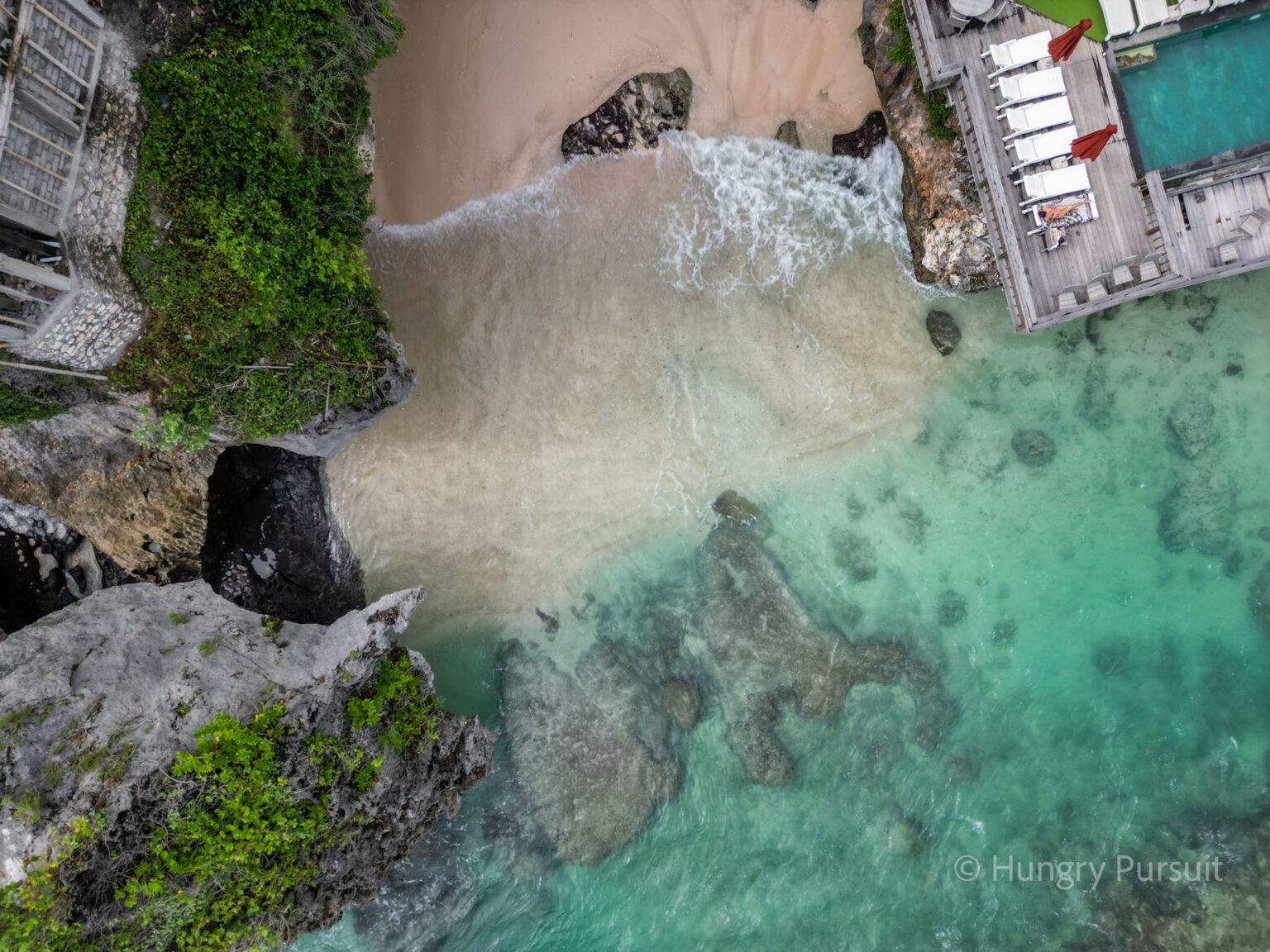 Things to Do in Uluwatu Suluban Beach View from the drone