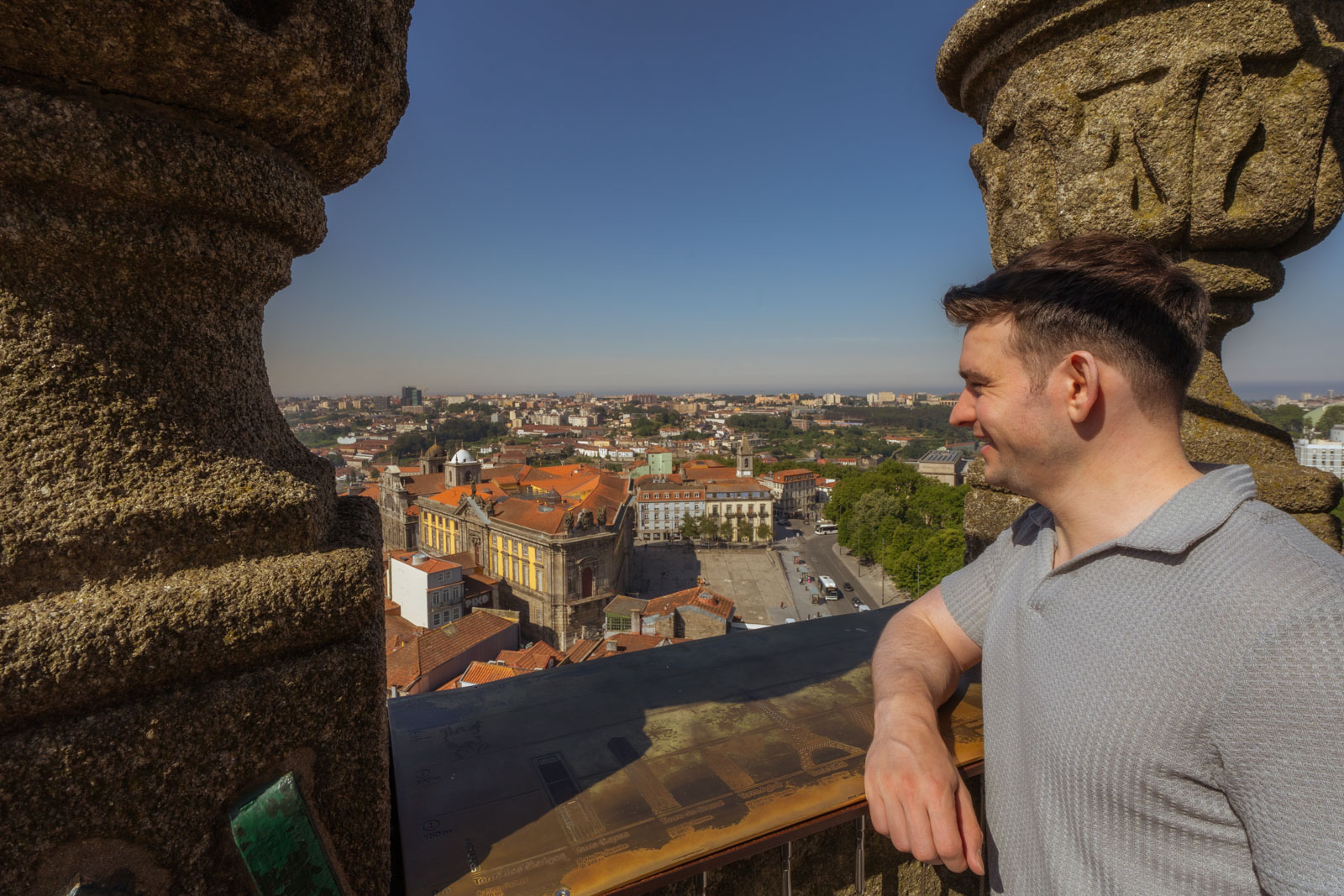 a man looking at the top of tower viewpoint, 1 day in porto