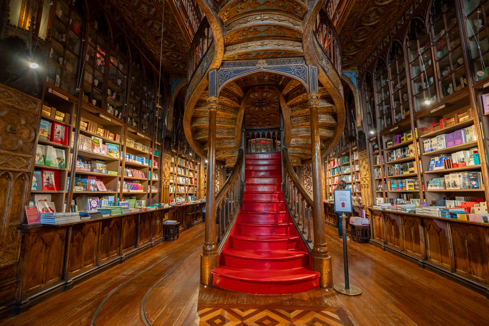 a picture of an empty staircase inside livraria lello porto; 2 days in porto itinerary.