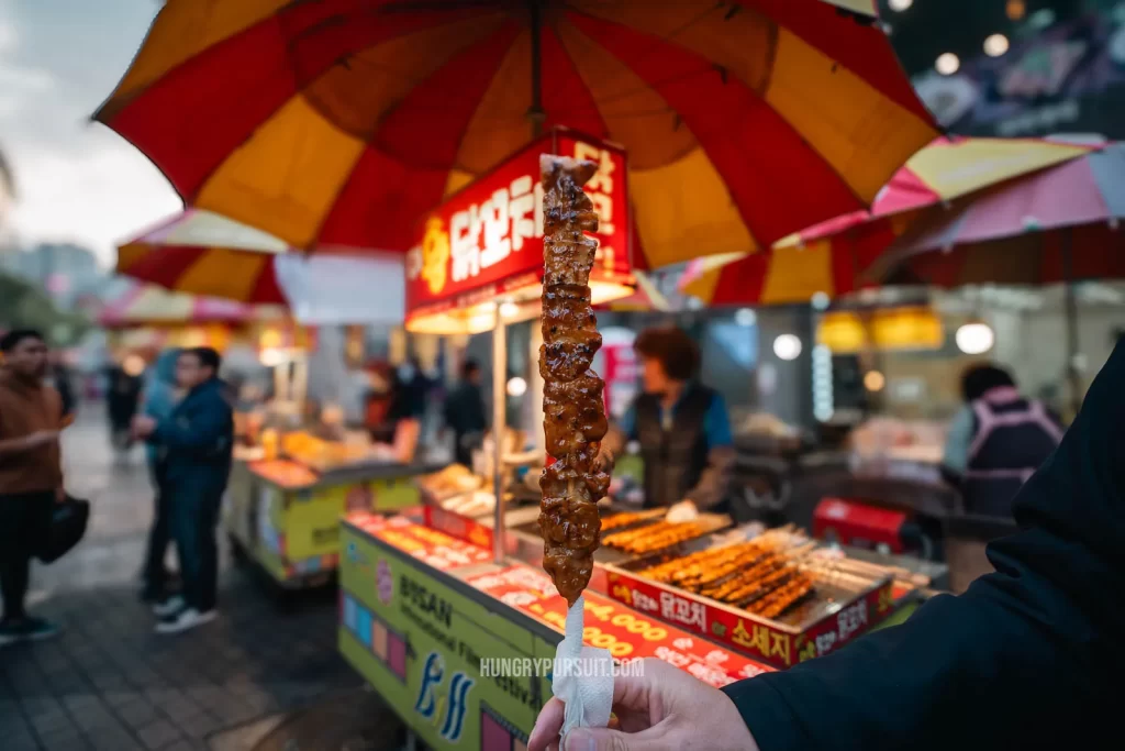 Busan itinerary BIFF Square Chicken skewer is korean street food