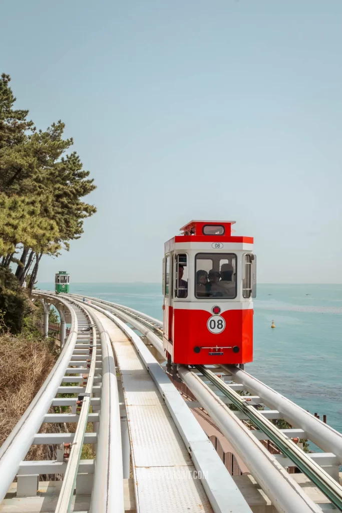 a Haeundae sky capsule gliding on the railway at Haeundae Blueline Park photos