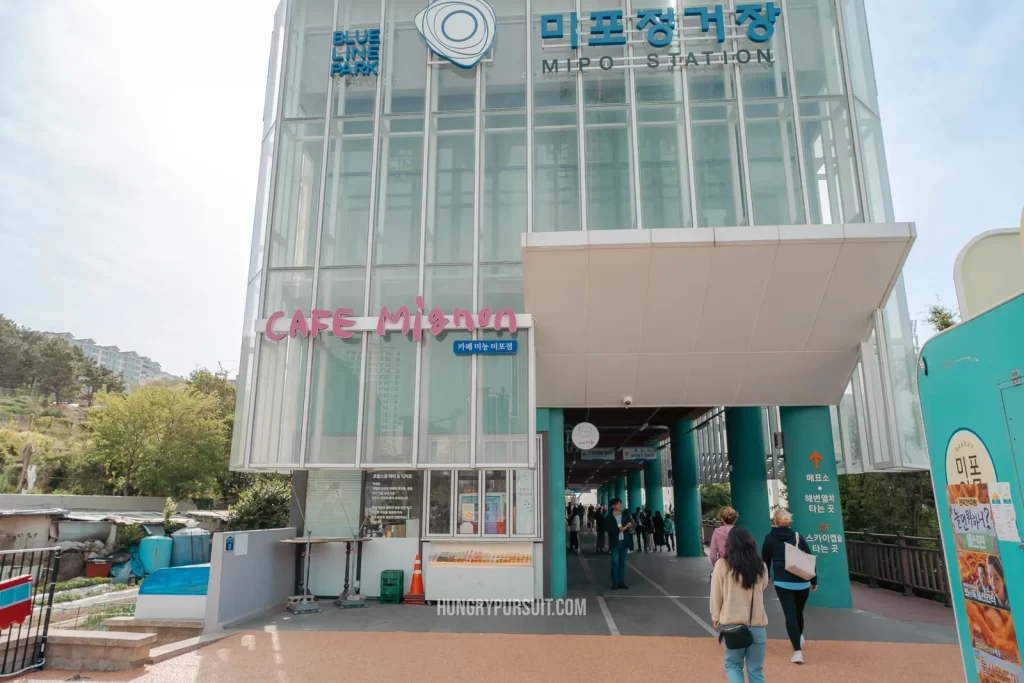 Haeundae blueline park opening hours front entrance of Mipo Station.