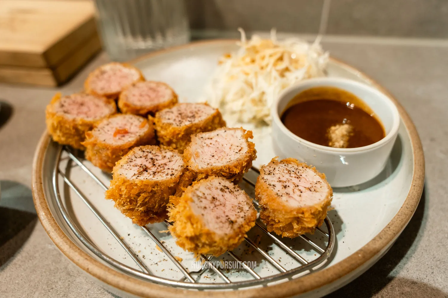 a plate of pork tonkatsu at millac the market; things to do in busan