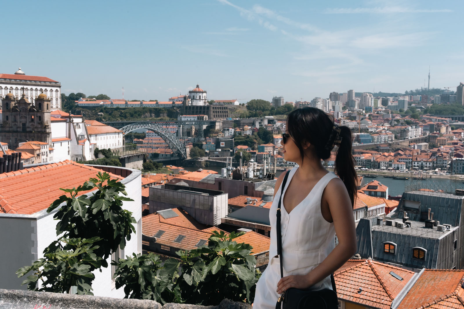 a woman observing Porto views from miradouro da vitoria; 2 days in Porto itinerary.